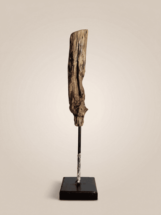 Totem of the Sun Defined by its radiant, sun-bleached tones and bold linear geometry, this piece is a high-concept