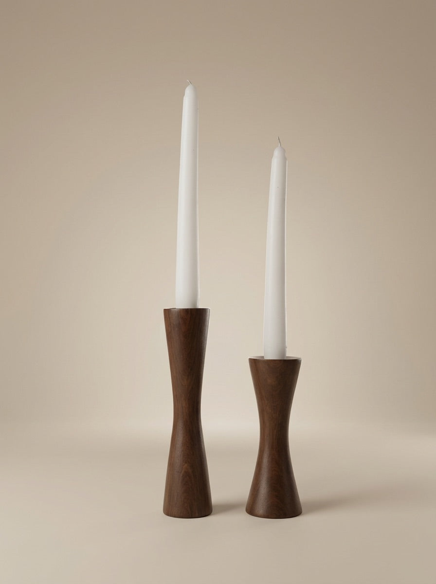 Mid-Century Modern Dark Wood Hourglass Candlestick Set (Set of 2) Infuse your home with sophisticated style using this set