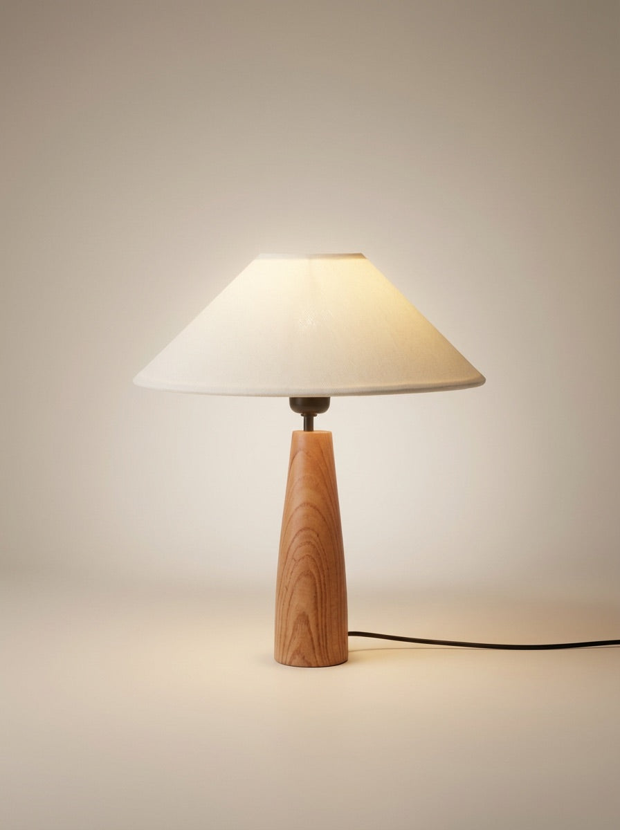 Radiant Cone Tapered Wood Lamp Bring a touch of minimalist elegance to your home with this beautifully handcrafted table